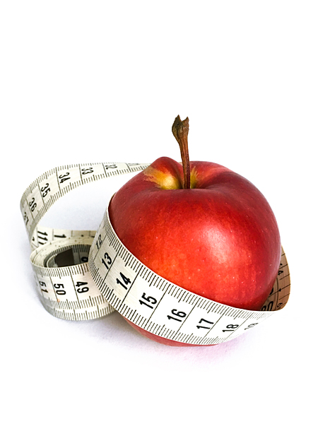 Apfel mit Massband Abnehmen gesunde Ernährung Obst essen